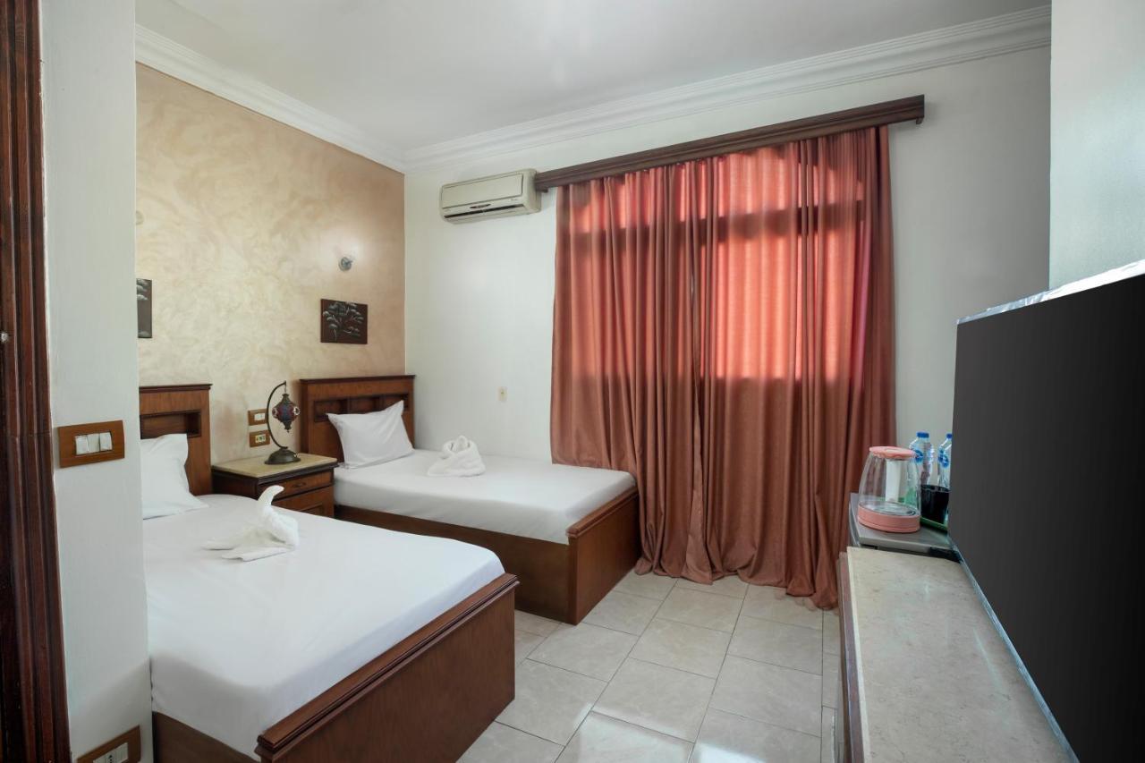 Pyramids Inn Hotel Kafrat al Jabal Экстерьер фото